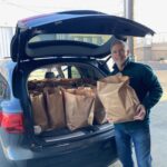 Mark pictured loading up his car with 60 bags, preparing to deliver them to residents at Miley Gardens, Loro Landing and EE Cleveland.